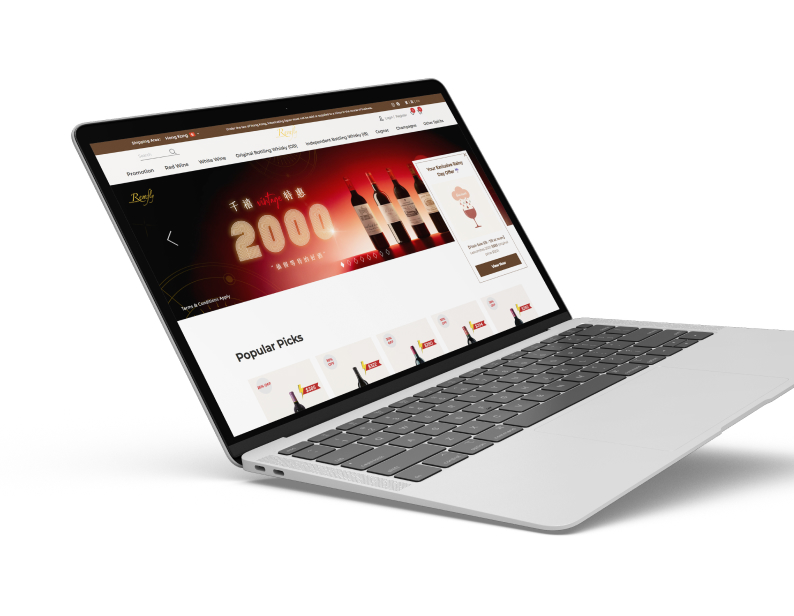 silver laptop displaying the Remfly Wine & Spirits websitetypoTypography